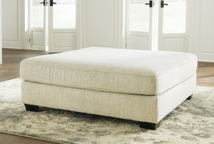  this firmly cushioned square ottoman is covered in a decadently soft chenille microfiber thatâ€™s love at first touch
