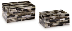 This mosaic patterned box set is a masterful interpretation of neutral hues. A stylish habitat to hide your tiny treasures, the set can store jewelry and accessories (along with other odds and ends), keeping clutter off the tops of your dressers and accen