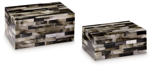 This mosaic patterned box set is a masterful interpretation of neutral hues. A stylish habitat to hide your tiny treasures, the set can store jewelry and accessories (along with other odds and ends), keeping clutter off the tops of your dressers and accen