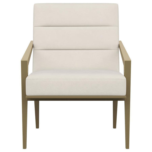  it boasts an upholstered seat and back with a metal frame and arms. The streamlined look receives a gleaming gold finish