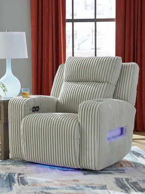  meet irresistible modern function. Your living room gets a cozy-cool upgrade with this power recliner. Curl up in its ultra-chic corded upholstery and recline with one-touch controls. Is it movie night or game time? With ambient LED lig