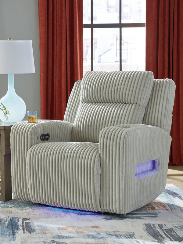  meet irresistible modern function. Your living room gets a cozy-cool upgrade with this power recliner. Curl up in its ultra-chic corded upholstery and recline with one-touch controls. Is it movie night or game time? With ambient LED lig
