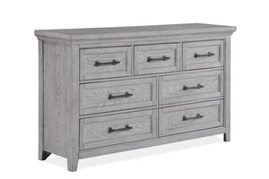 This bedroom suite offers a refreshing take on rustic charm, featuring a soft greige finish that highlights the natural wood grain. The sturdy bed stands as the centerpiece with its robust headboard and inviting design, while the accompanying pieces â€” a