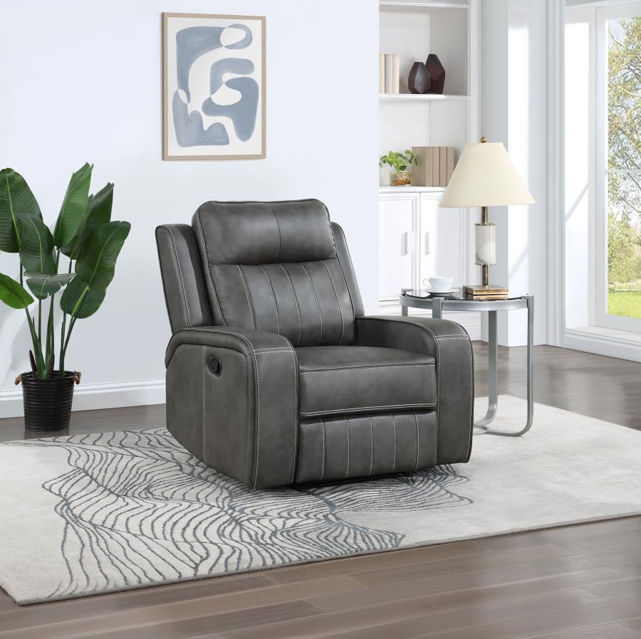 Merging the classic style of both contemporary and transitional design schemes, the recliner creates a dreamy venue for relaxing. The trending look of smooth grey leatherette upholstery with vertical topstitching delivers decorative elements and a dimensi