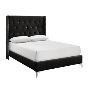 The Huxley Upholstered Bed in Black is a marvel of contemporary glam and durable construction. This bed set includes a headboard, footboard, two side rails, and a slat kit, all crafted from manufactured woods and eco-friendly decorative laminate for long-