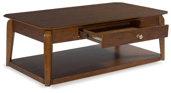  its softly rounded top and tapered legs offer a mid-century appeal well-suited to styles from modern to eclectic. A spacious storage drawer k