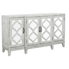 Elevate your space with this elegant accent cabinet featuring mirrored door panels and intricate lattice overlay. The soft white finish and vintage bronze hardware lend a timeless charm, while the spacious interior shelving keeps your essentials neatly st