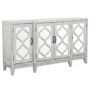 Elevate your space with this elegant accent cabinet featuring mirrored door panels and intricate lattice overlay. The soft white finish and vintage bronze hardware lend a timeless charm, while the spacious interior shelving keeps your essentials neatly st
