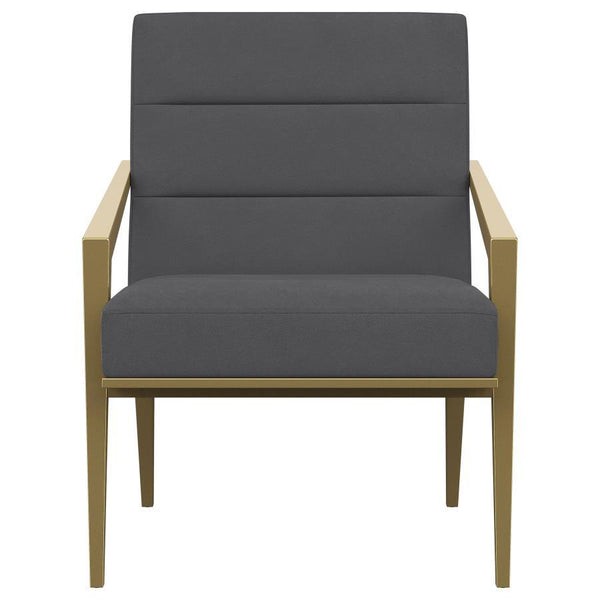  it boasts an upholstered seat and back with a metal frame and arms. The streamlined look receives a gleaming gold finish