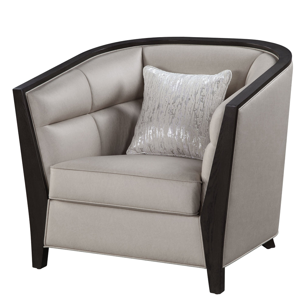 Create a homey and inviting casual space with Zemocryss Chair. The chair features tight back and loose seat cushion in beige fabric for a soft hue and cozy comfort. Pocket coil seating boasts good support and durability, with high shelter arms and tufted 