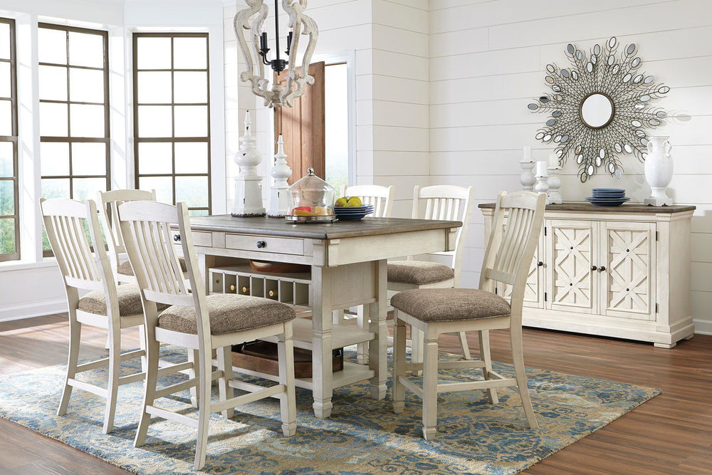 Unique two-tone finish with a combination of Oak and Acacia substrates combining a trendy textured antique white color with table and server tops finished in a textural weathered oak finish. Rectangular dining table features six convenient drawers for sto