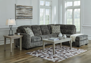  the plush upholstery and dark tri-block legs are a natural complement for so many color schemes. On-trend track arms provid