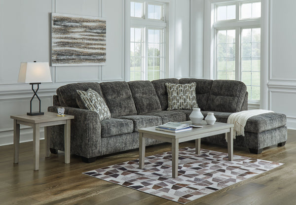  the plush upholstery and dark tri-block legs are a natural complement for so many color schemes. On-trend track arms provid