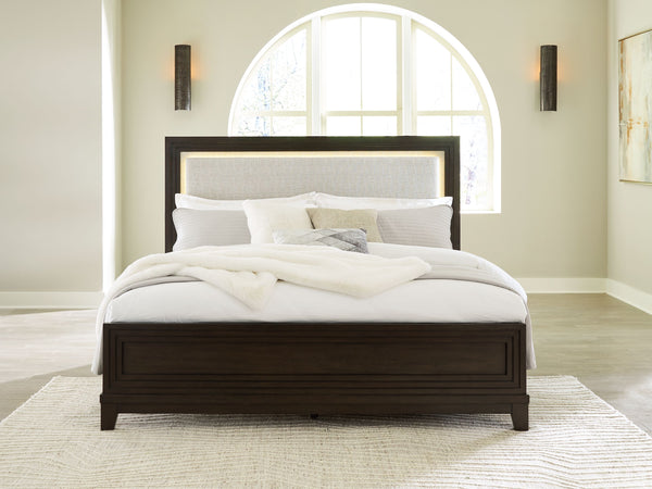  this king upholstered panel bed completes your sanctuary with fashionable functionality. LED backlighting steals the show