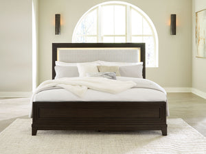  this California king upholstered panel bed completes your sanctuary with fashionable functionality. LED backlighting steals the show