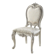 Add traditional glamour to your dining space with the Devayne side chairs. They are as comfortable as they are beautiful with their foam padded seats and backrest. Upholstered in sumptuous jacquard fabric for an added stylish touch. Floral moldings are pr