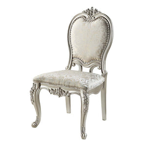 Add traditional glamour to your dining space with the Devayne side chairs. They are as comfortable as they are beautiful with their foam padded seats and backrest. Upholstered in sumptuous jacquard fabric for an added stylish touch. Floral moldings are pr