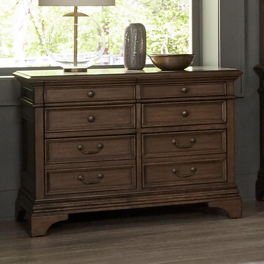 A stately upgrade for the traditional filing cabinet. This piece is crafted for classy office spaces. An expansive tabletop with molding accents offers an elegant option to place office items. Eight drawers flaunt round knobs and traditional style bar pul