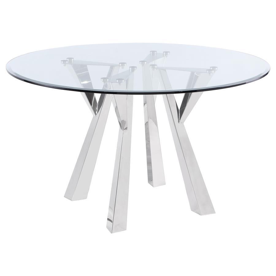 Center your sophisticated dining space on the impeccably designed Alaia round dining table. Instilling a sense of glamorous energy, the table boasts a geometric base design crafted in metal with rich angularity and elegance. Gleaming chrome finish plays u