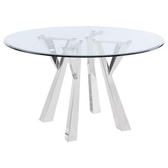 Center your sophisticated dining space on the impeccably designed Alaia round dining table. Instilling a sense of glamorous energy, the table boasts a geometric base design crafted in metal with rich angularity and elegance. Gleaming chrome finish plays u