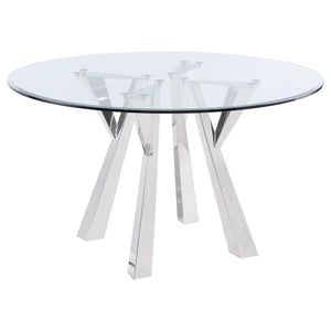 Center your sophisticated dining space on the impeccably designed Alaia round dining table. Instilling a sense of glamorous energy, the table boasts a geometric base design crafted in metal with rich angularity and elegance. Gleaming chrome finish plays u