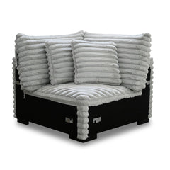 The Embrace Sectional Wedge with 2 Accent Pillows in gray is a stylish and functional addition to your sectional setup. Upholstered in 100% gray polyester fabric with a plush, blanket-like texture, this wedge promises ultimate relaxation. It comes with tw