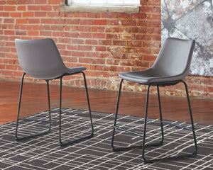  this bar stool serves up a fresh twist on mid-century inspired style. Chic gray faux leather upholstery adds to the aesthetic. What a timeless look for eat-in kitchens and casually cool di