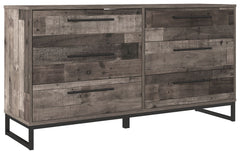 Streamlined design and a stunning finish come together in one simply extraordinary piece. This dresser is sure to impress with six smooth-operating drawers, canted metal legs and a rustic butcher block finish over replicated pine grain texture. Its mid-ce