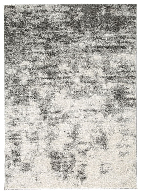 This area rug persists at the forefront of contemporary design. With an abstract design in shades of cream, gray and charcoal, it presents itself as the superlative choice to update your decor space.<br/><br/><b>Product Features</b><ul><li>Made of polyest