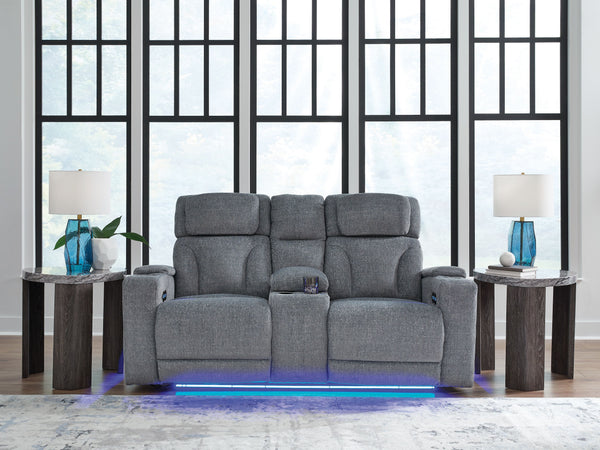 while the extended ottoman takes your comfort to the next level. Handy charging features and 