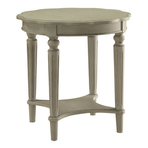 The French country-inspired Fordon occasional table is gracefully designed and made from quality materials. Scalloped round table top, turned legs and a bottom shelf, each piece is carefully crafted while superb functionality is kept in mind. This occasio