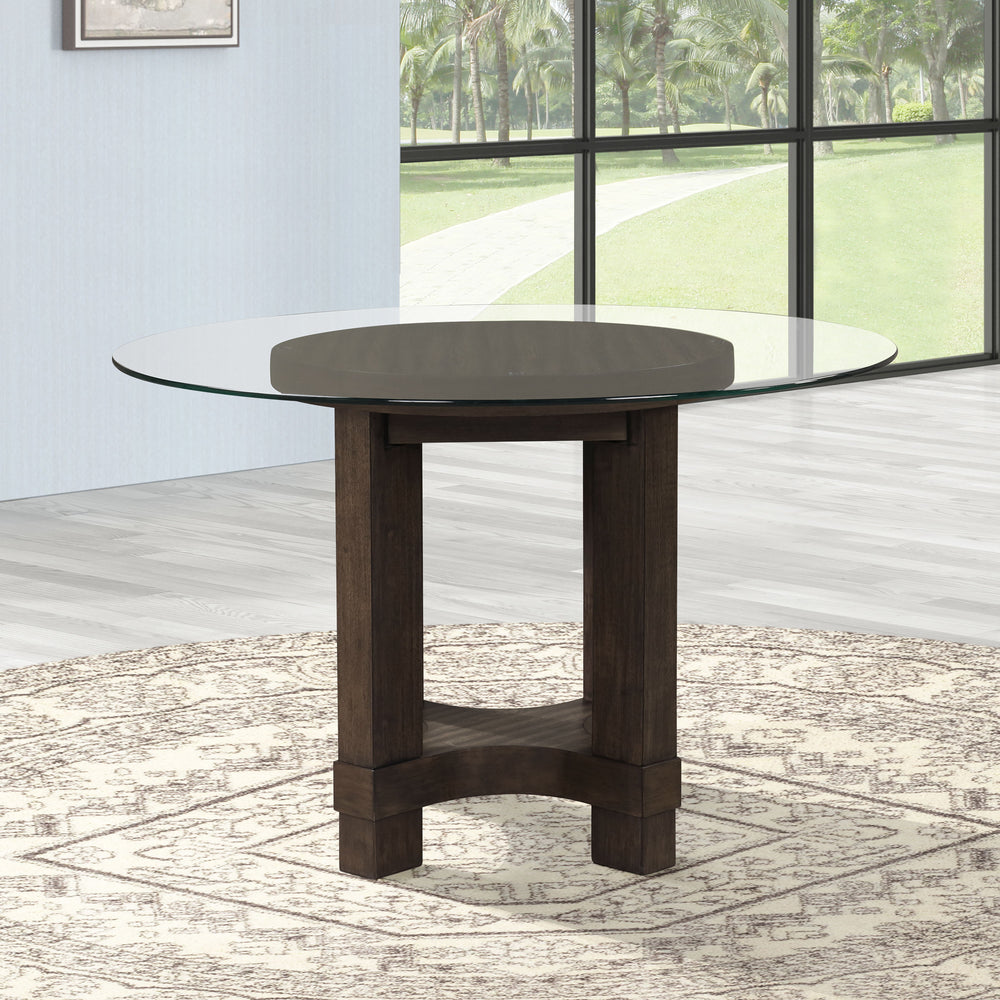 The Cityscape Glass Top Dining Table combines modern design with long-lasting durability, making it an ideal addition to any dining area. Crafted from a blend of Rubberwood solids, manufactured woods, and real Oak veneers, this table offers the strength a