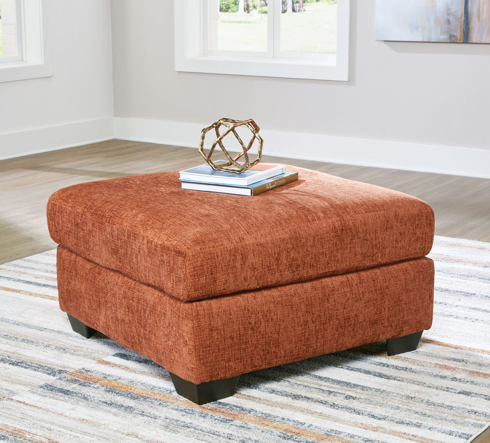 Looking to make a bold statement with color? Liven up your living room with this oversized ottoman. Its trend-right burnt orange upholstery adds a playful pop of color to your decor. Pairing posh style with everyday comfort, this piece is a welcome additi