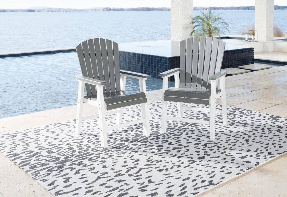 Pull up a chair on the back deck or poolside and gather around for good times. These two-tone outdoor dining chairs have sturdy legs in crisp white, with the arms, seat and back in a cool shade of gray. A slatted seat and back allow drainage to prevent ra
