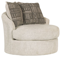 Flaunting a trendsetting silhouette, this swivel accent chair puts the contemporary in your contemporary home. Its 360-degree swivel gives you an around-the-room view to complement your comfort. And the chunky chenille fabric satisfies your need for a pie