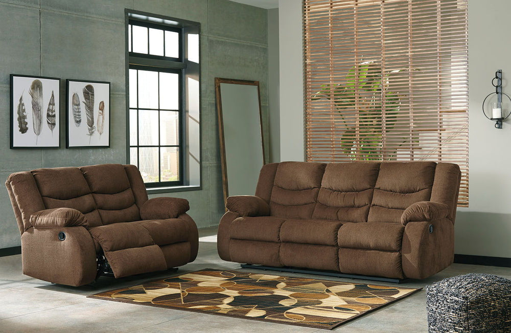 This reclining set puts the win in winning. Its waterfall back design and doubly plump pillow top arms team up with soft chenille fabric to go for the goal. Ample seating room makes the comfort possibilities endless. Sit back and relax. You wonâ€™t go wro