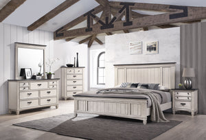  anchors the space with its traditional charm. An integrated footboard ben