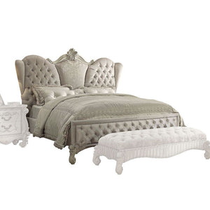 The Versailles Collection harmonizes traditional details with functional design to accommodate today-'s styles. This bedroom collection features bone white veneers, nailhead trim accents, button tufted headboard/ footboard, padded side rails, and hand-car