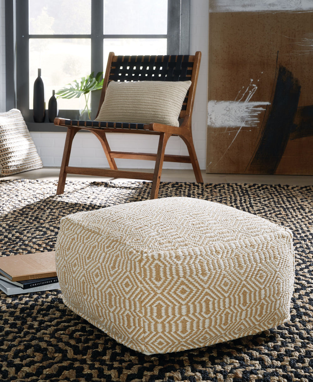 Fill your home with an aura of relaxed flair. This pouf-'s bold handwoven geometric design creates visual intrigue without being too busy, adding a casually cool vibe while you kick back in style. The neutral hues of the cotton cover feel fresh and organi