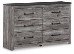 Alluring smoky gray hues create an ambiance that just feels right. This 6-drawer dresser has a charming wood-like appeal enriched by a two-tone, textured look. Light neutral shades contrasted by a dark charcoal finish bring a refined yet relaxed feel to c