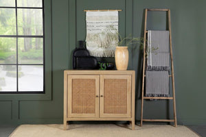  crafted from eco-friendly mango wood in a natural finish. The woven cane door panels add a touch of retro charm