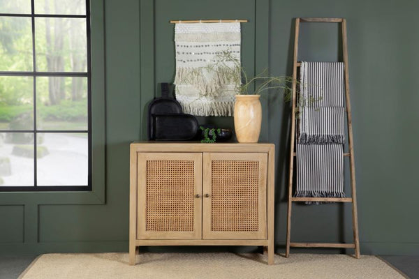  crafted from eco-friendly mango wood in a natural finish. The woven cane door panels add a touch of retro charm