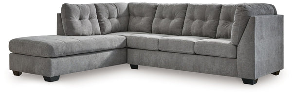 This sectional with chaise takes a homey approach to high style. Its gray coloration has classic versatility, while a contemporary silhouette and stitched details keep the look totally on trend. And you can count on comfortâ€”the chaise invites you to kic