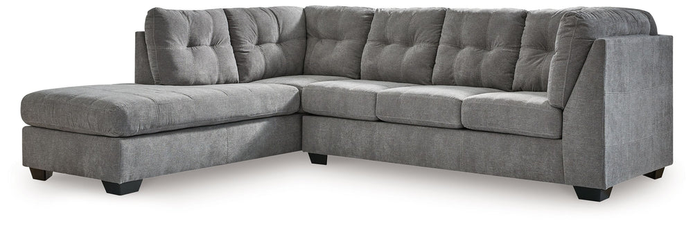 This sleeper sectional with chaise takes a homey approach to high style. Its gray coloration has classic versatility, while a contemporary silhouette and stitched details keep the look totally on trend. And you can count on comfortâ€”the included queen ma