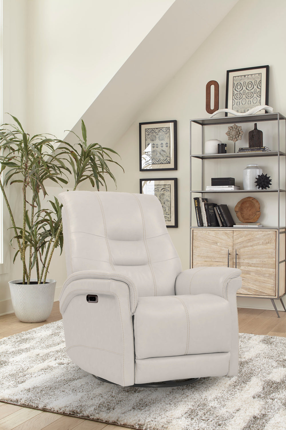 Relax in the seat of luxury with the Carnegie. Offered in glove soft Top Grain Leather and fashionable colors, this ultimate glider/rocker has a 360-degree swivel providing easy view of your entire space. The included FreeMotionÂ® Cordless Battery allows 
