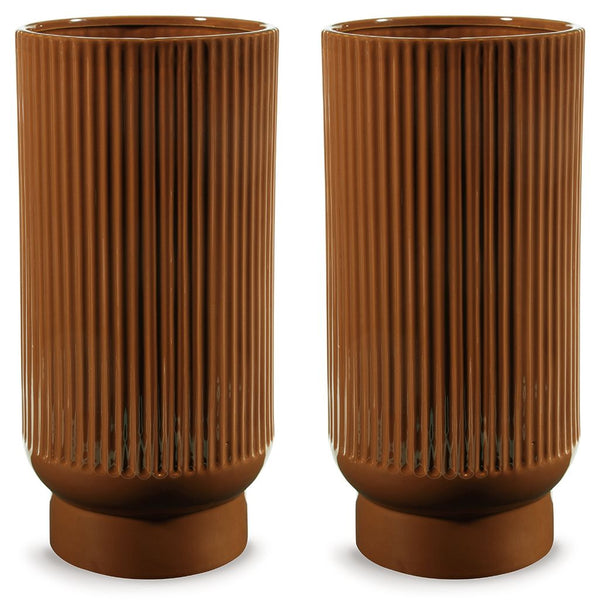This ceramic vase makes a relaxed style statement. Its casual design and earthy burnt umber glaze complement your laid-back sensibilities. Delightfully simple and simply delightful, this vase subtly wows on its own or when filled with your favorite flower