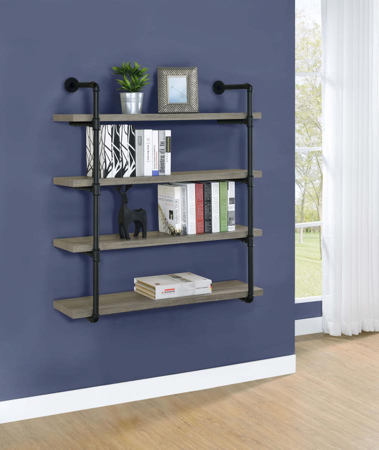 Industrial design can be elegant, as shown by this wall shelf. Plumbing pipe frame highlights the rugged utility that-'s the hallmark of the style. Wall hanging adds a unique element to the piece. Incorporates four (4) open shelves for ease of storage or 