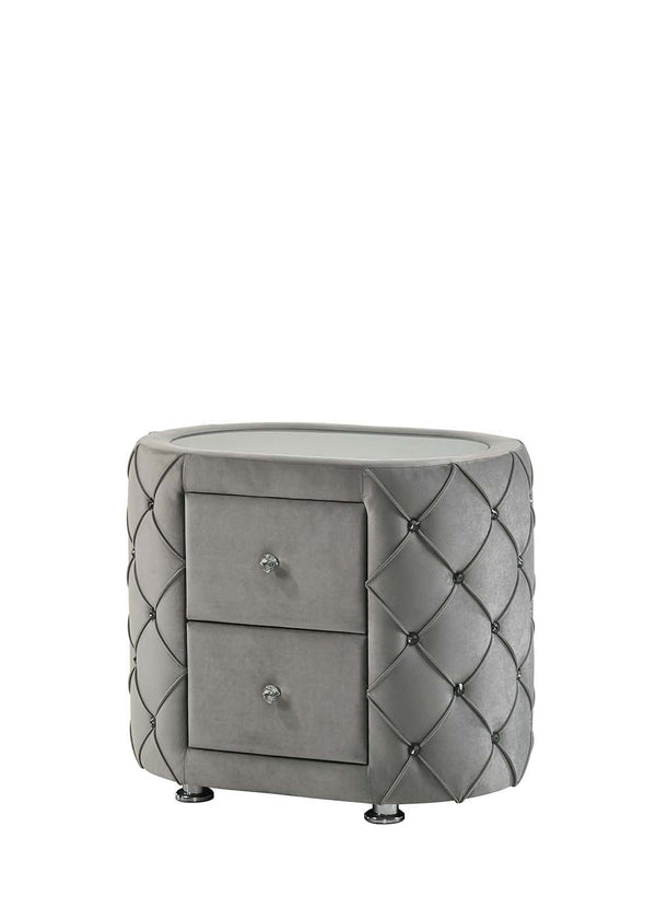The Perine Collection is luxuriously designed and upholstered in sumptuous gray velvet and features black piping. The hardwood wooden frame is designed for long-lasting enjoyment. The crown design on the headboard and footboard adds some drama to the bed.