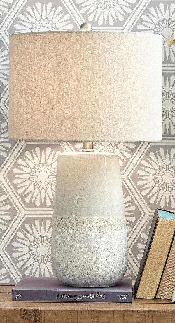  this monochromatic table lamp brings thoughts of sun