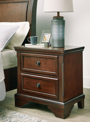  while round metal knobs in a dark bronze tone create a beautiful focal point on two stylishly subtl
